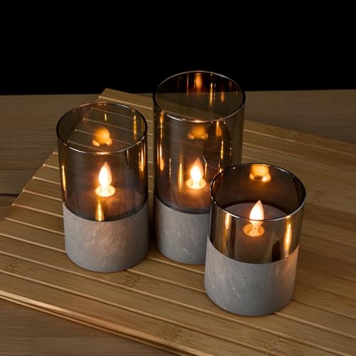 Image of amazon basics LED Pillar Candles, Set of 3 (7.5X10 CM, 7.5X12.5 CM, 7.5X15 CM), Dark Tint Glass with Cement Base, Flameless Flickering, Remote & Timer, Indoor Decorative Lighting
