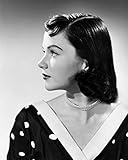 Young woman looking sideways Poster Print (24 x 36)