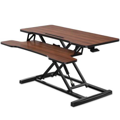 Image of FITUEYES Height Adjustable Standing Desk 36 inch Wide Sit to Stand Converter Stand Up Desk Tabletop Workstation for Laptops Dual Monitor Riser Brown SD309102WE