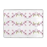 La alfombra AKGFFDS con estampado de flores de cerezo de 80 x 58 pulgadas es fácil de cuidar, es lavable y resistente al desprendimiento, por lo que es una opción práctica y elegante para cualquier persona que busque añadir un toque de elegancia y comodidad a su espacio vital, oficina o balcón.