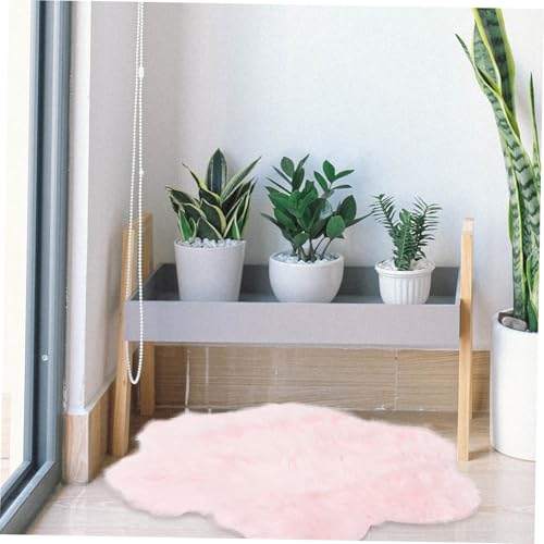Tapis fleur pelucheux rose à texture epaisse et douce pour lit