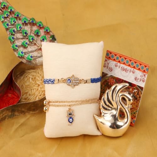 Image of Chocozone Evil Eye Rakhi for Brother & Bhabhi Rakhi Lumba Set for Bhai Bhabhi Rakhi Gifts for Bhai with Roli Chawal & Card Rakshabandhan Gifts for Brother