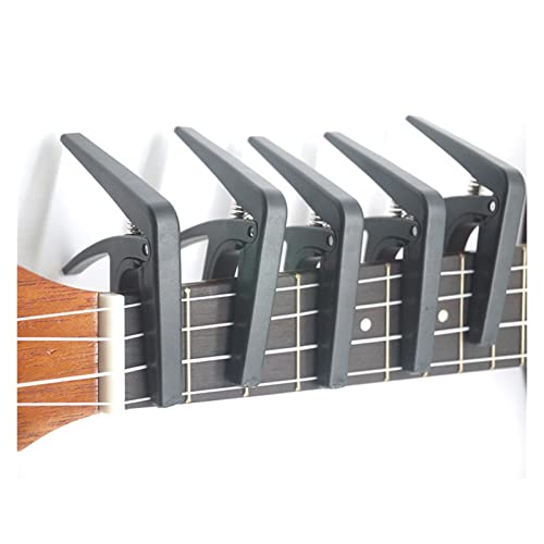 SHANGMAOYO Capodastre Ukulele Style Déclenchement À Une Seule Main Changement Rapide Spring 4 Strings Pièces Accessoires… - Les Beatles, Paul McCartney, John Lennon, RIngo Starr, George Harrison SHANGMAOYO Capodastre Ukulele Style Déclenchement À Une Seule Main Changement Rapide Spring 4 Strings Pièces Accessoires… – Image 3