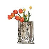 Die Vase hat eine glatte Oberfläche und eine einzigartige Öffnung. Fügen Sie Ihrer Dekoration einen Hauch von hellen Farbe hinzu, aber auch eine große Ergänzung zu Ihren Gartendekorationen.