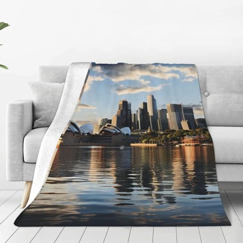 Couverture canapé microfibre douce Sydney : dites adieu aux plaids lourds