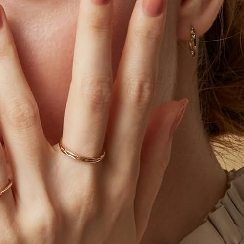 Bague entrelacée réglable fini les doigts serrés avec cet argent doré