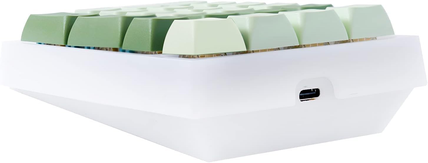 BOYI TD21 Numpad package contents including numpad, keycap puller, USB-C cable, extra switches, and user manual.