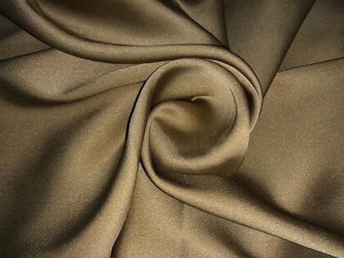 Tissu soie lycra satin or pour confectionner une robe fluide et élégante
