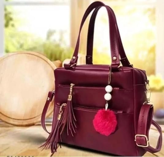 Image of Ladies Faux Leather Satchel Handbag, Burgundy, Double Zip Compartments, Tassel Charm, Pom Pom Accessory, Shoulder Strap
