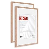 【Immortalisez l'Instant】Ce cadre photo élégant s'adapte parfaitement aux formats 50x70 cm et peut également accueillir un passe-partout pour des tirages 40x50 cm. Grâce à ses dimensions précises, il assure un ajustement parfait et met en valeur chaque image avec une touche d'esthétisme raffiné.