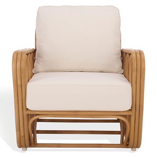 Sillón con estructura de ratán y cojín blanco