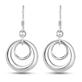 MODERN CIRCLE DANGLE DESIGN Interlocking concentric circles create a clean, geometric silhouette that brings stylish motion and balanced elegance to every look. POLISHED .925 STERLING SILVER Crafted from stamped sterling silver with a high-shine fini...