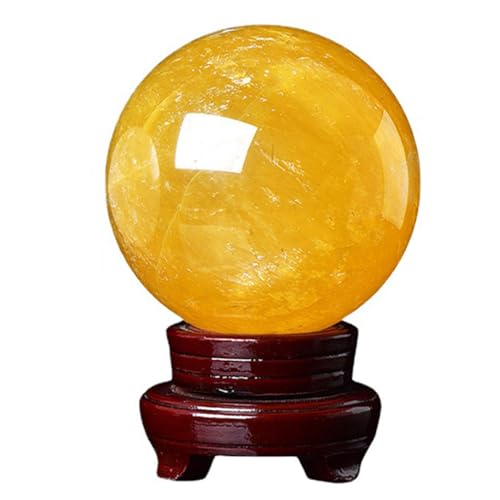 Boule de cristal citrine sur votre buffet de salon pour une décoration chaleureuse