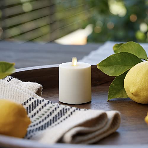 Image of Luminara Outdoor Votive Flameless LED Candle, Pearl Ivory 2 inch x 3.2 inch, Moving Flame Battery Operated Timer Remote Ready IPX4 Matte Plastic Finish