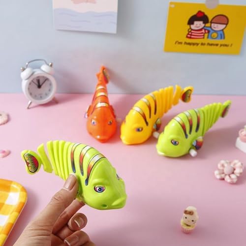 6PCS Clockwork Swinging Cartoon Fish Toys, Plastic Fish Toys, Fish Toys for Kids, Cartoon Fish Toys, Robot Fish, Robotic Fish (Random Color) 2 41dKJPM4eCL. AC