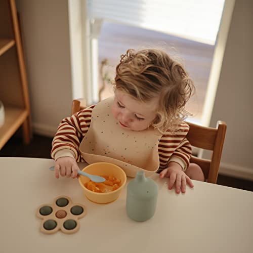 Image of mushie Silicone Baby Bib | Adjustable Fit Waterproof Bibs (Vanilla Confetti)