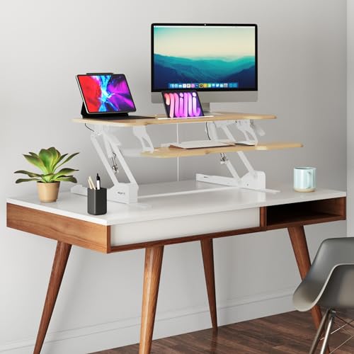 Image of Mount-It! Height Adjustable Standing Desk Converter, 38 inch Wide, Desk Riser for 2 Monitors, Manual Gas Spring Sit Stand Desktop Raises to 16.9 inch, Fits Two Monitor Screens with Keyboard Mouse Tray Maple