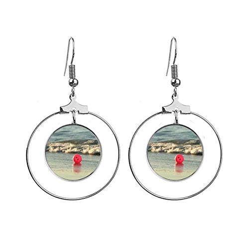 Pendientes de aro colgantes ideales para tus looks de verano y días de playa