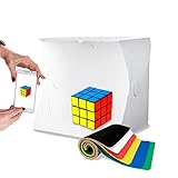El paquete incluye: 1 x Caja principal de estudio (con 1 panel LED), 6 x fondos: blanco / negro / rojo / amarillo / verde / azul, 1 x Micro USB Cable, 1 x Manual de Usuario, 2 x hebillas de fijación.