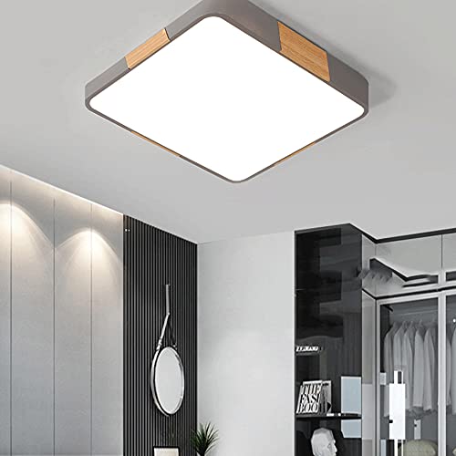 Plafonnier LED en bois extra plat pour illuminer les plafonds bas avec élégance