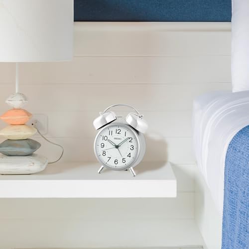 Image of Seiko QHK063S Analog Alarm Clock | Bell Alarm, Snooze, Light, Quiet Sweep Second Hand | White Dial, Silver Plastic Case (Size: 15.2 x 7.6 x 12.2 CM | Weight: 180 gram)