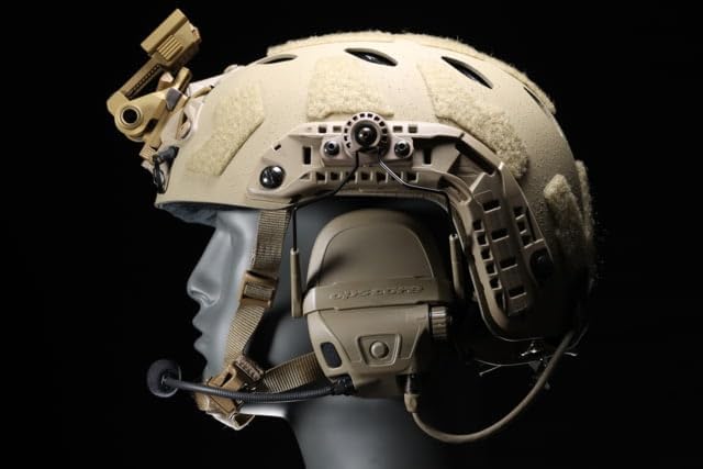 Side profile of a helmet with the Ops-Core AMP headset mounted via the MARK system, showing the low-profile integration.