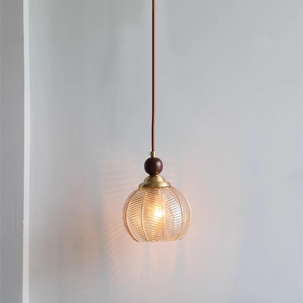 Lampe suspendue pour chevet : optimisez l'espace de votre table de nuit