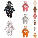 Combinaison d'hiver pour bébé. Avec des motifs d'animaux sur le devant, de jolies oreilles sur la capuche. Avec les pieds couverts, conçu pour les petits bébés