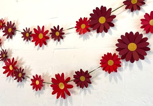 Image of Red Daisy Flower Wall and Party Decor. This Easy Decor kit Comes with 18 Paper Flowers, Needle, 10 feet Satin Ribbon and Sticky Foam Squares.