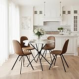 Suggestion du chef : cette table de salle à manger ronde est accompagnée d'un élégant cadre en acier noir et de panneaux de bois délicats et d'une coupe douce, lui donnant une touche de style scandinave.