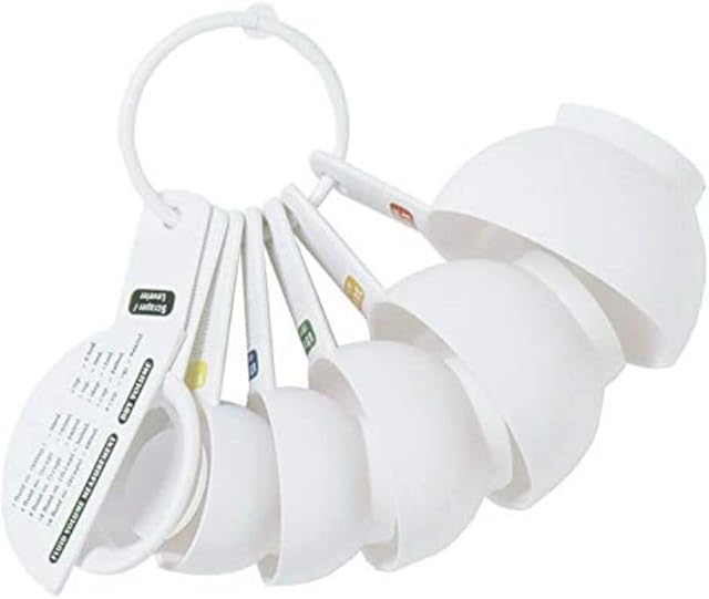Tala Kitchen Measuring Set, In White Plastic and contains 7 Measuring Cups Including 1 cup/240ml, 3/4 cup/180ml, 1/2 cup/120ml, 1/3 cup/78ml, 1/4 cup/60ml