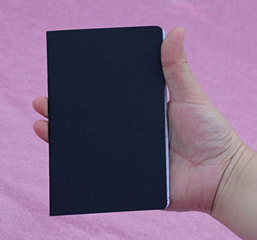 Mini journal portable au design épuré noir avec pages intérieures blanches haut de gamme