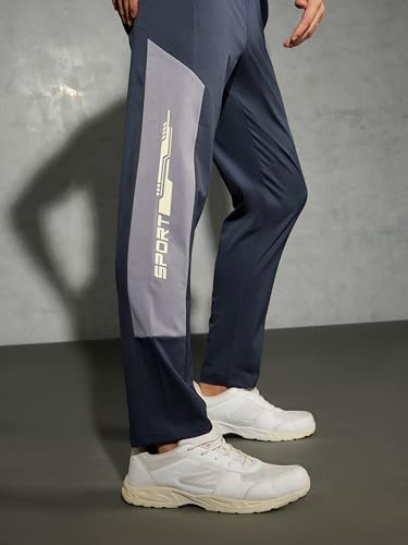 Image of TECHNOSPORT Men Colorblock Slim Fit Sports Trackpants TS Flexi Polyester Mid Rise Drawstring Track Pant for Men Pockets Gym Workout Running Joggers Casual Quick Dry