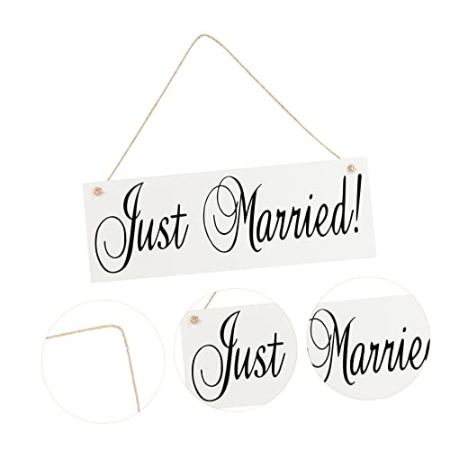 Pasillo de bodas decorado con accesorios fotográficos de madera elegantes 3