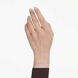 Swarovski Bracelet Tennis de la collection Matrix, avec une alternance de petits et moyens cristaux incolores de taille ronde, fermoir boule coulissante, placage de ton or - 6