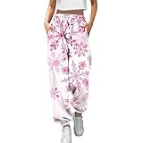 Design pratique: pantalon de jogging féminin à jambes larges et droites, taille élastiquée ajustable par cordon de serrage et deux poches latérales pratiques pour transporter vos essentiels en toute sécurité.
