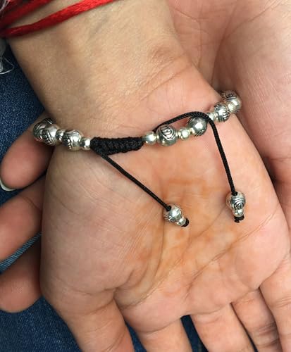 Image of Touchstone New Indian Bollywood Handcrafted Magical Look Engraved Metallic Beads Elegant and Attractive Designer Jewelry Openable Thread Bracelet in Oxidized Silver Tone for Women.