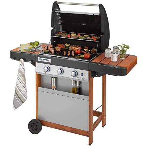 Campingaz Gas BBQ serie 3 Woody LX, barbecue a gas in acciaio inox a 3 fuochi, carrello per barbecue in legno e tavolini laterali, grill a gas con griglia e piastra in ghisa, plancha, grill da giardino, facile pulizia del barbecue