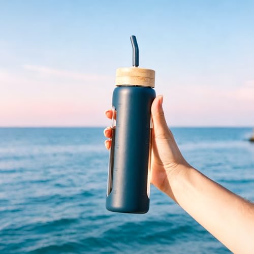 Image of 24 oz Glass Water Bottle with Straw - 2 Lids (Bamboo & Spout Lid), Motivational Borosilicate Glass Daily Water Intake Bottle with Time Marker, Silicone Sleeve for Gym Home Office-Dark Blue