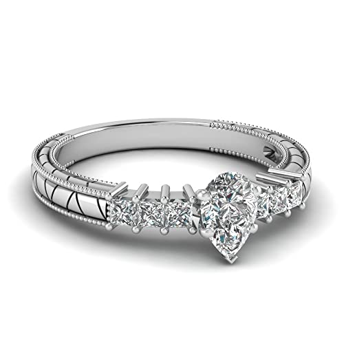 Bague vintage diamant poire pour votre tenue de fête élégante