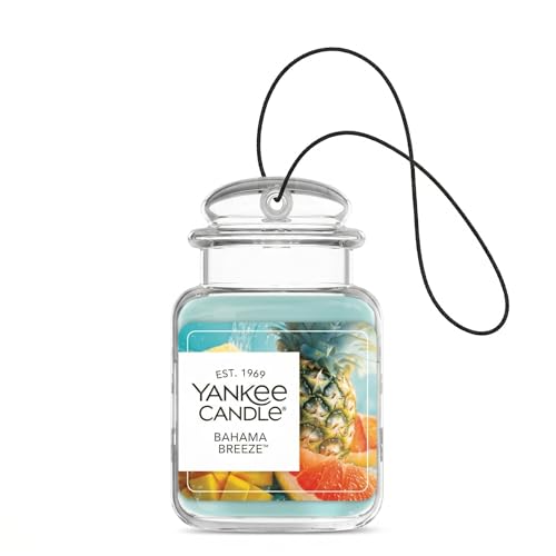 Image of Yankee Candle Car Jar Ultimate, Bahama Breeze Scented Hanging Air Freshener to Neutralize Odors and Refresh Small Spaces with Tropical Fragrance, 0.96 Ounce (Pack of 12)