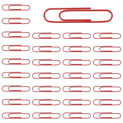 Porte-documents et grands trombones rouges pour trier le papier à la maison