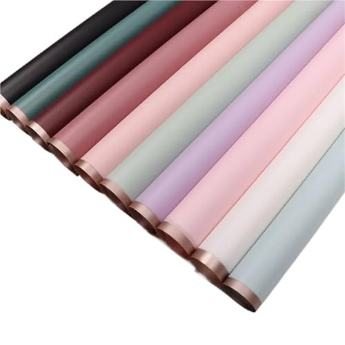 Papier cadeau pour fleuriste rose demi-transparent avec lisière dorée