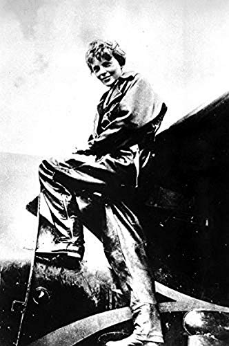 Amelia Earhart on an airplane Photo Print (8 x 10)