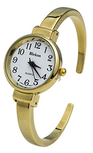 Montre à quartz pour femme avec un bracelet en métal délicat de 26 mm de diamètre