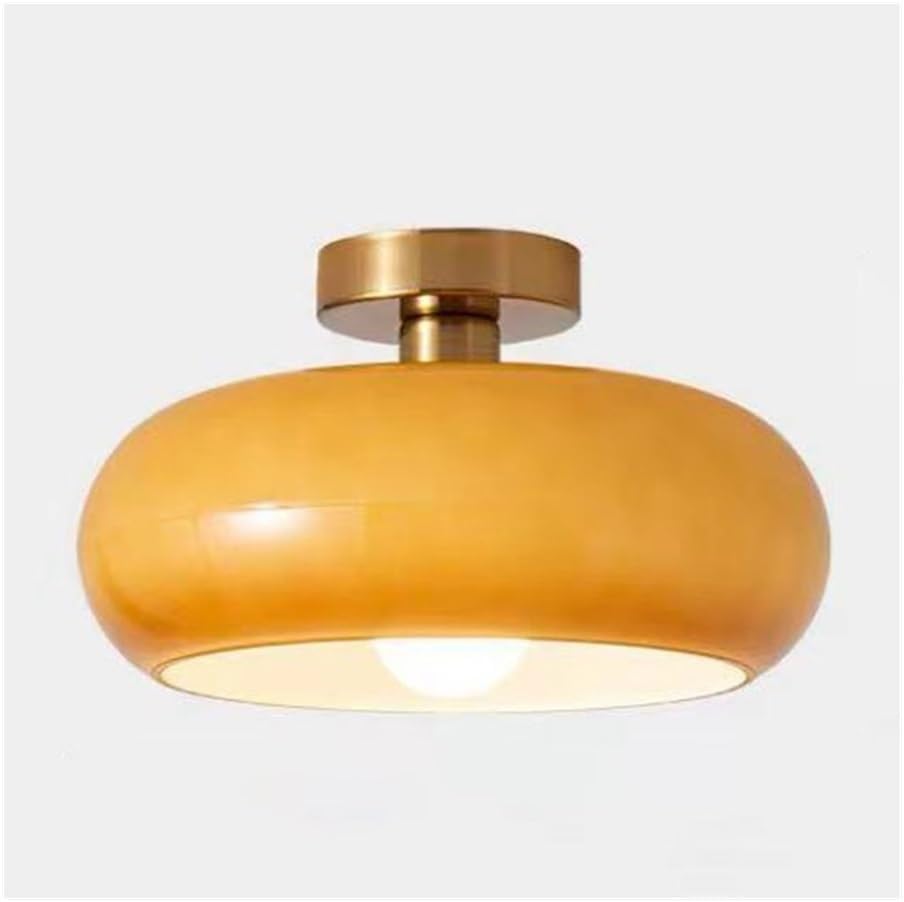 Plafonnier en verre dôme orange pour éclairer un couloir sombre avec ce luminaire plafond rétro