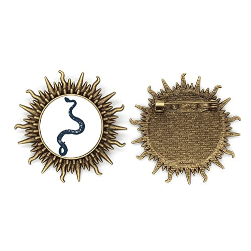 Broche serpent noir métal aux finitions sculptées et design artistique