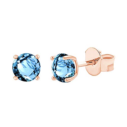 Boucles d'oreilles topaze bleue or rose puces élégantes pour sublimer le quotidien