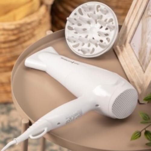 Quinta immagine Remington Asciugacapelli 2200W - Anello in ceramica Ionic Care per una ottima distribuzione del calore - 3 livelli di riscaldamento, 2 livelli di ventola separati + raffreddamento, 2 accessori, D3199