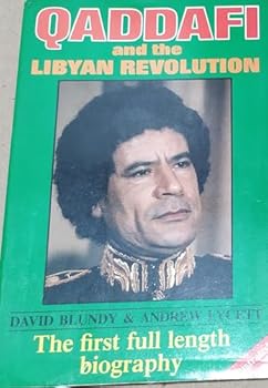 Paperback Qaddafi and the Libyan Revolution Book